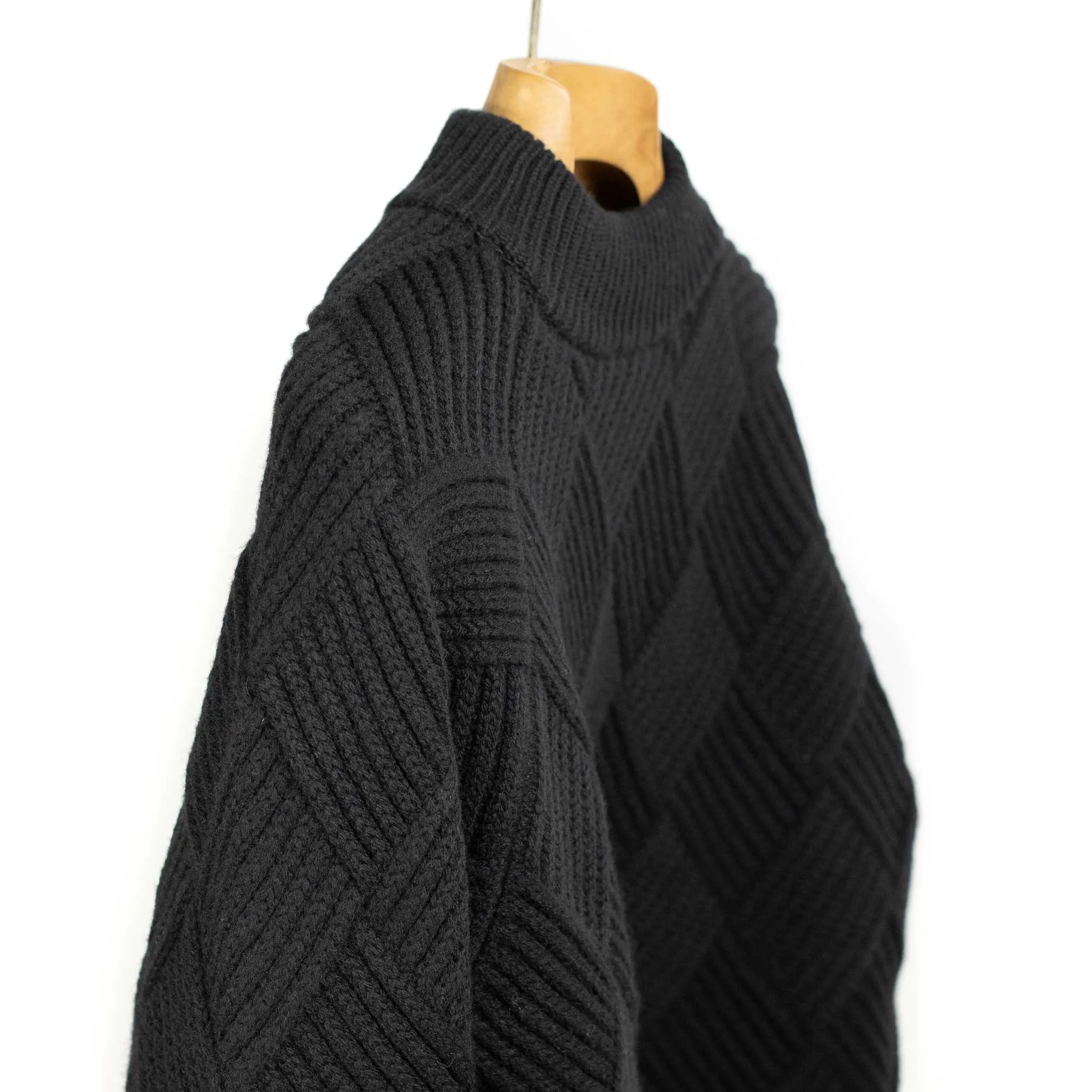 Basketweave mockneck sweater in black Merino wool