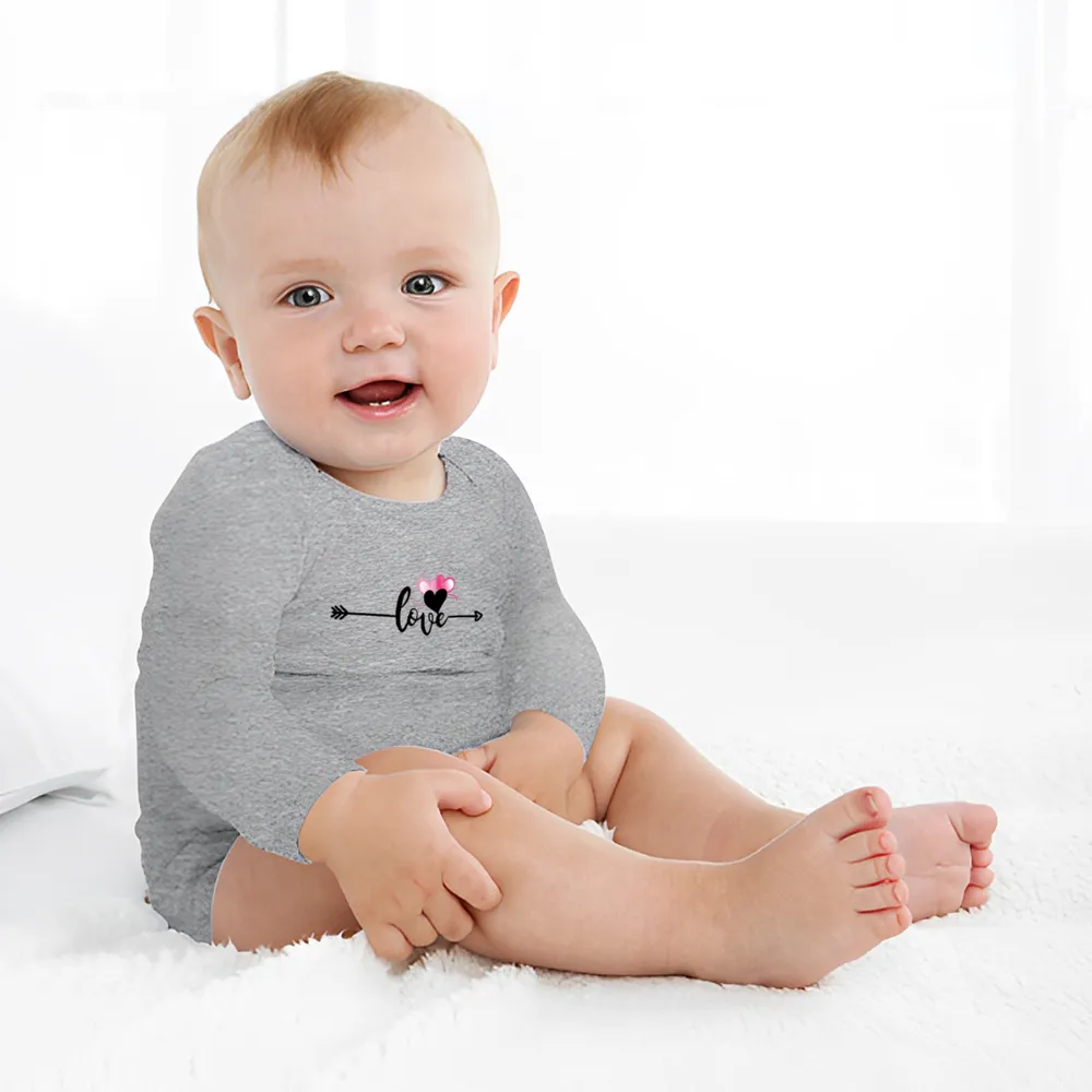 Love in Motion Baby Onesie