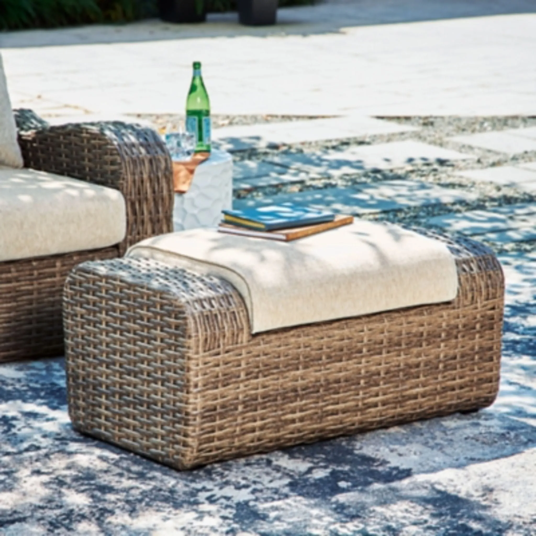 Outdoor Sandy Bloom Ottoman with Cushion